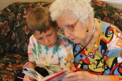 Resident reads to child