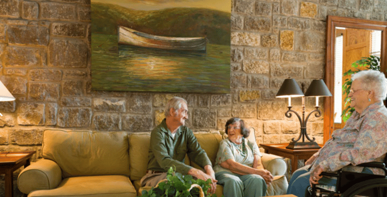 Photo of elderly people sitting on a couch at Lakewood Loudon