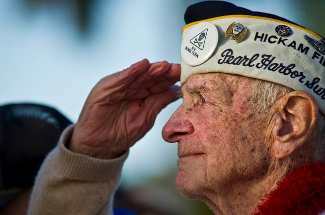 photo of an elderly veteran saluting