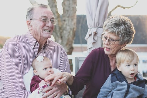 grandparents with their grandchildren