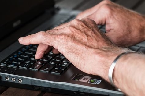 senior citizens use laptops