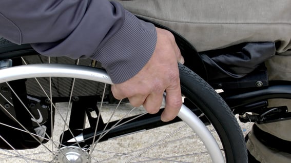 hands on wheelchair