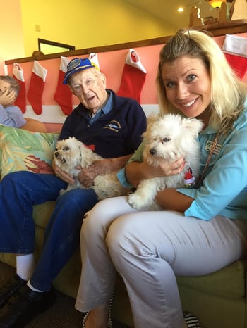 Elderly residents are visited by dogs in Nursing Home