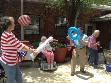 Senior residents playing games as summer activities