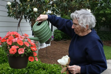 Senior Living Resident while gardening