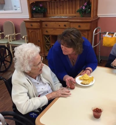 Assisted Living caregiver with resident