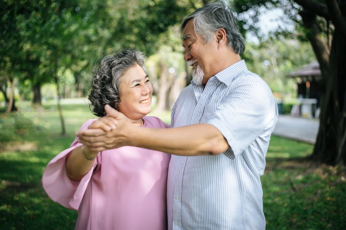 Senior Couple Dancing Outside